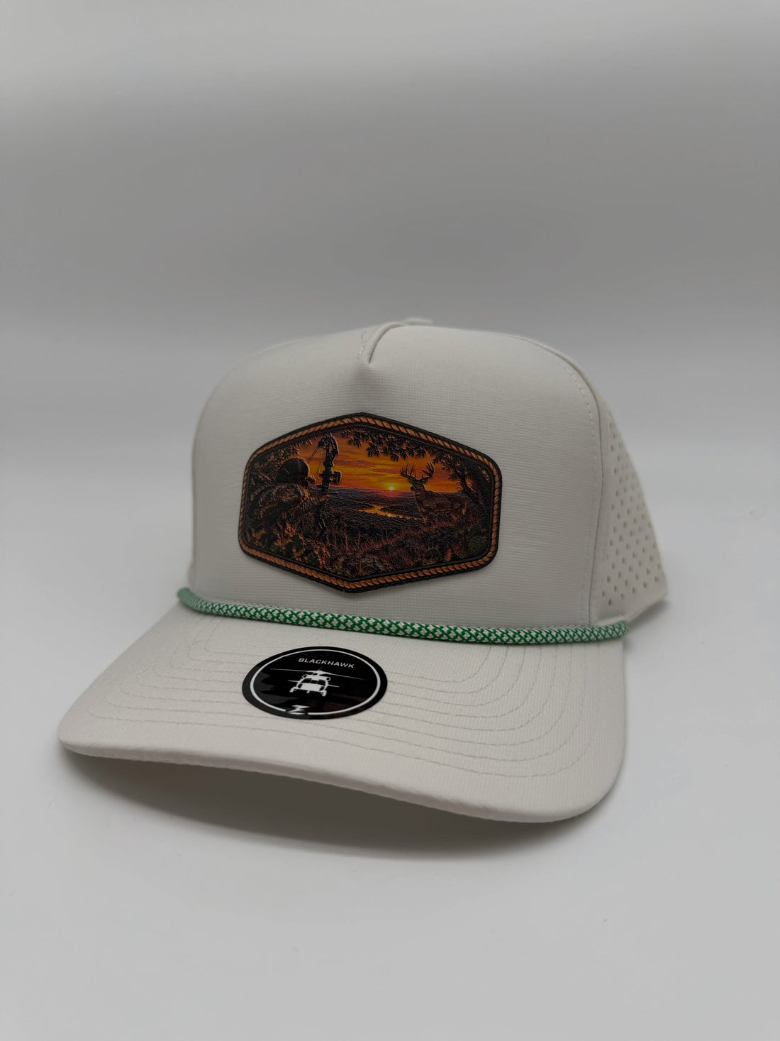 White rope hat with a full-color hunting scene patch